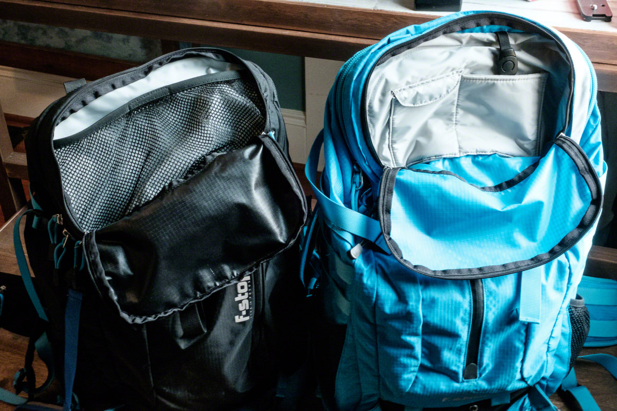 The Kashmir (left) has a mesh top with one piece of velcro to close it, and the Loka (right) has small pockets to hold memory cards, business cards, etc.
